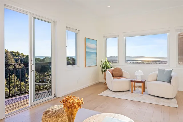a view of balcony with furniture