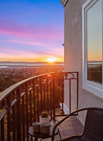 a balcony with a view of living room