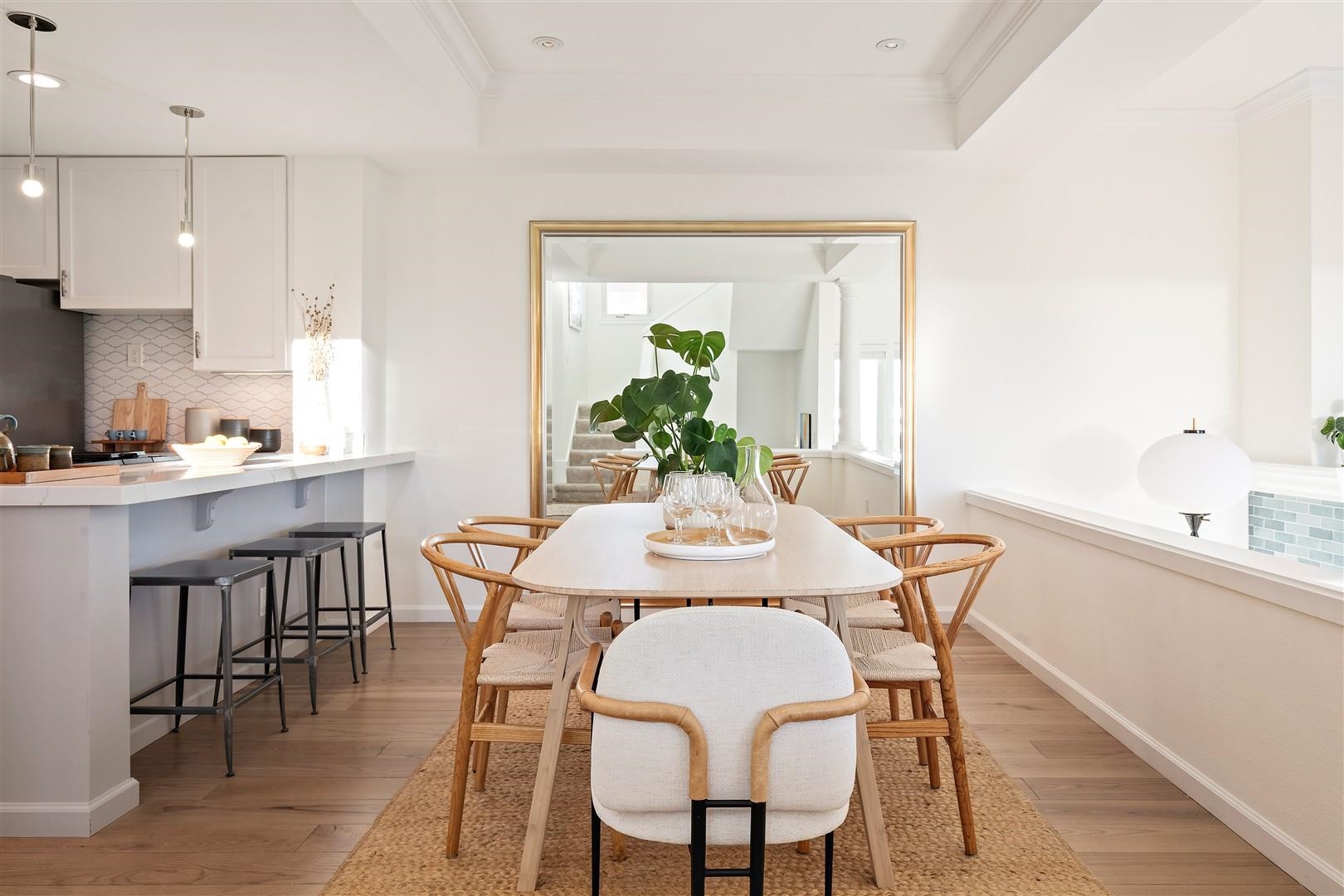 4630 Redwood Road Oakland, CA 94619 - Photo 23 of 58 a view of a dining room with furniture and wooden floor