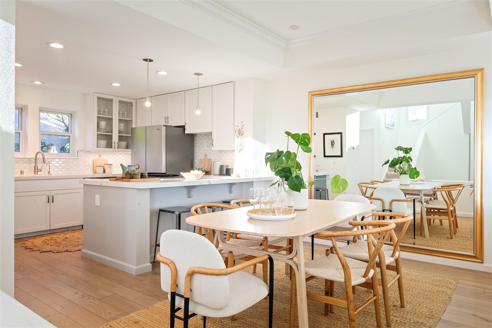 4630 Redwood Road Oakland, CA 94619 - Photo 25 of 58 a kitchen with a table and chairs in it