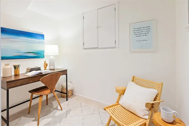 a bathroom with a shower sink vanity mirror and toilet