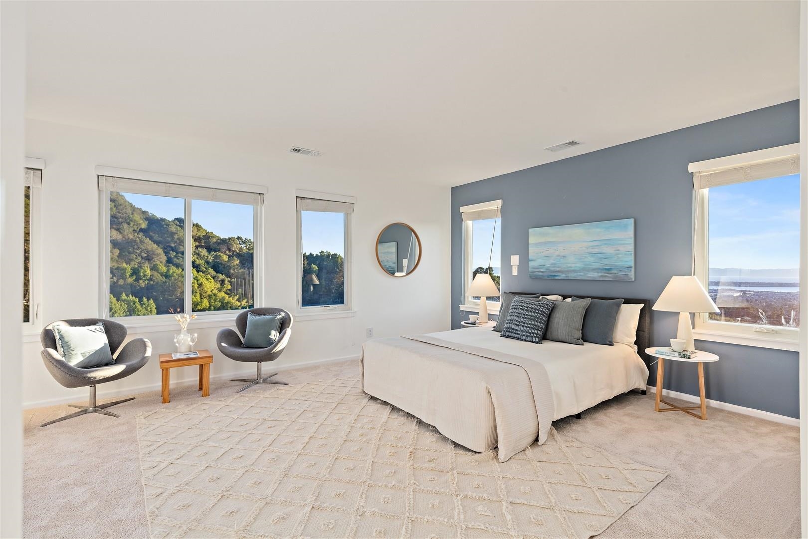 4630 Redwood Road Oakland, CA 94619 - Photo 45 of 58 a bedroom with a large bed and a large window