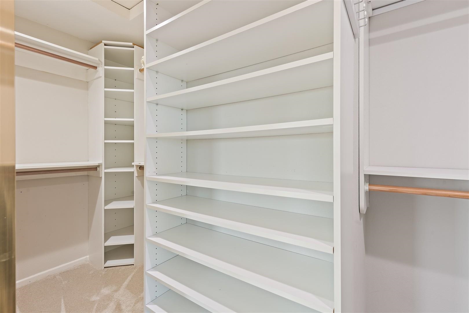 4630 Redwood Road Oakland, CA 94619 - Photo 50 of 58 a view of walk in closet with empty racks