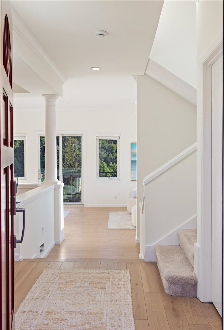 4630 Redwood Road Oakland, CA 94619 - Photo 9 of 58 a view of entryway and hall with wooden floor