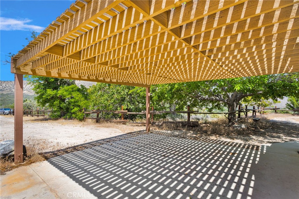 5500 Oil Well Road Phelan, CA 92371 - Photo 39 of 65 a backyard of a house with lots of green space