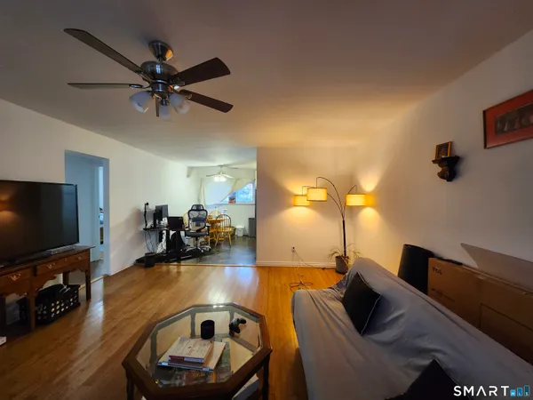 a kitchen with a sink a refrigerator and a stove
