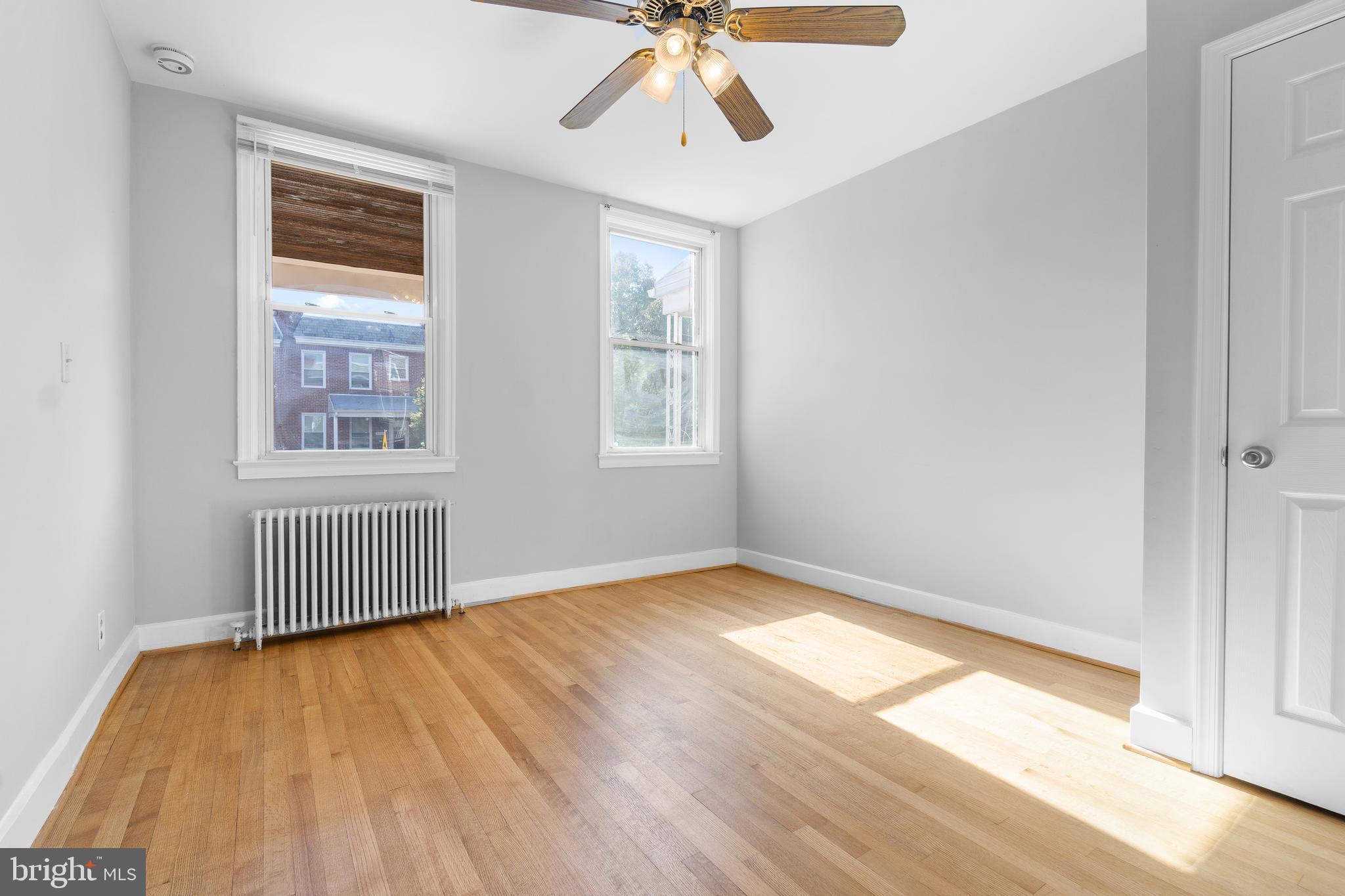 3572 Juneway, Unit 1 Baltimore, MD 21213 - Photo 4 of 23 a view of an empty room and window