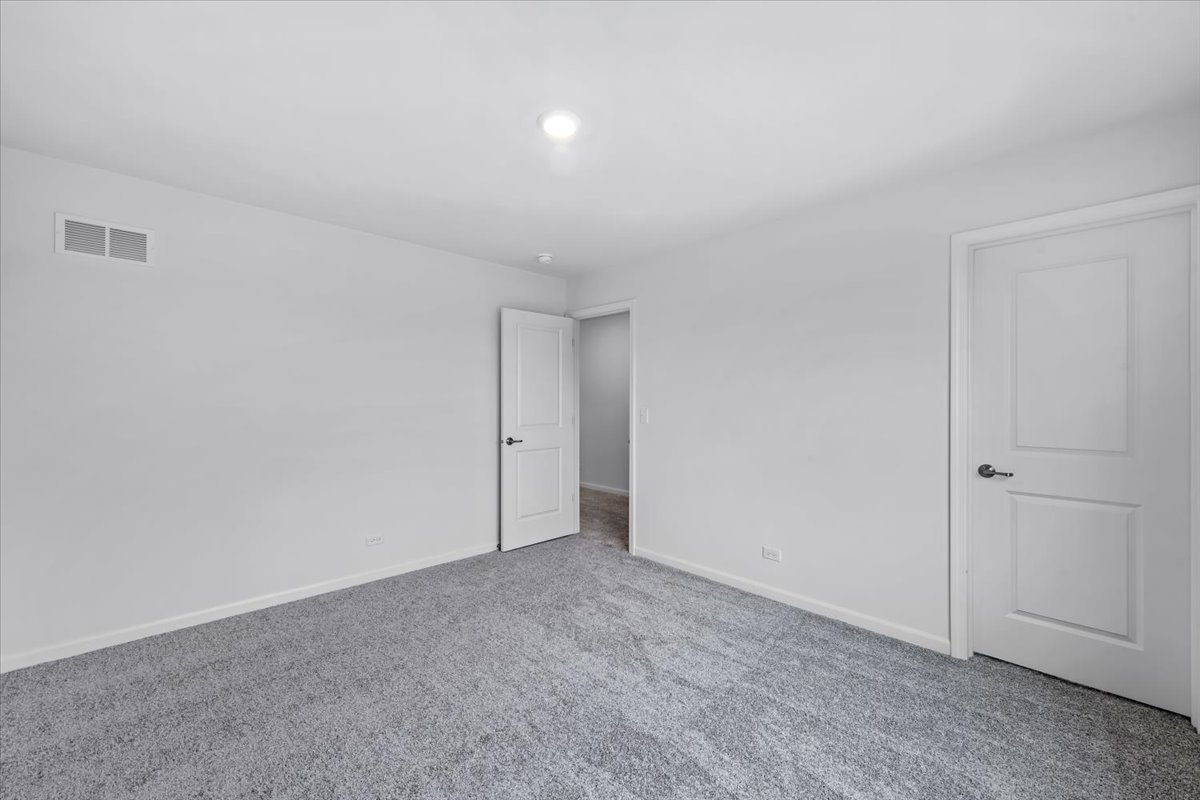 87 Hedgerow Drive Elgin, IL 60124 - Photo 23 of 52 a view of an empty room