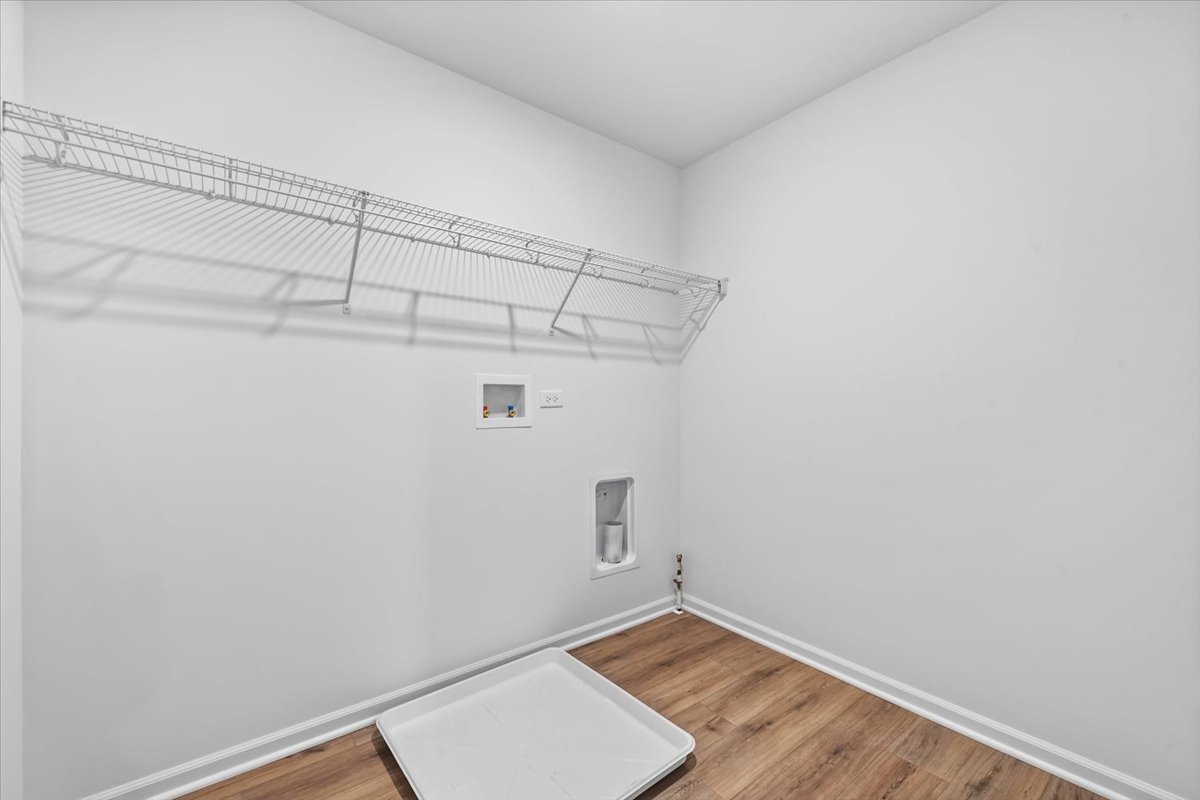 87 Hedgerow Drive Elgin, IL 60124 - Photo 27 of 52 a view of a small space with wooden floor