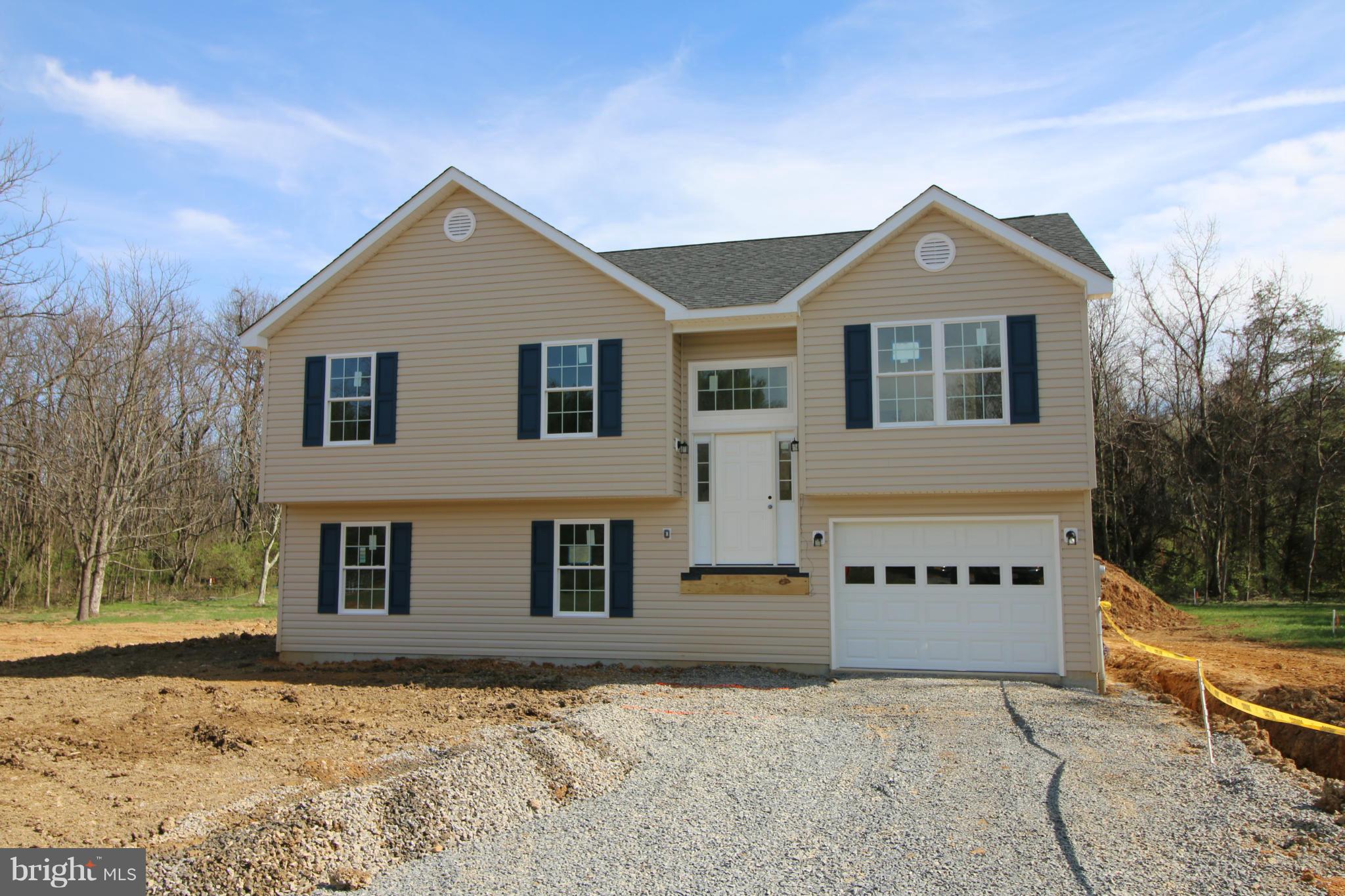 2710 Welltown Road Clear Brook, VA 22624 - Photo 1 of 6 a front view of a house with a yard