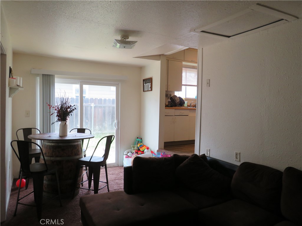 312 West Cedar Street Willows, CA 95988 - Photo 14 of 21 a living room with furniture and wooden floor