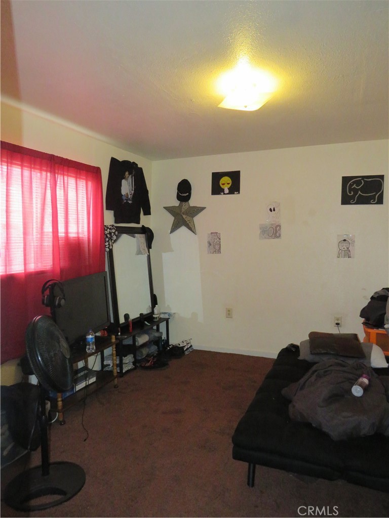 312 West Cedar Street Willows, CA 95988 - Photo 15 of 21 a room with gym equipment and a large window