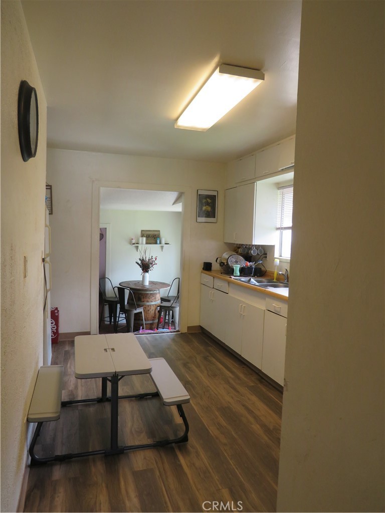 312 West Cedar Street Willows, CA 95988 - Photo 9 of 21 a living room with furniture and a table