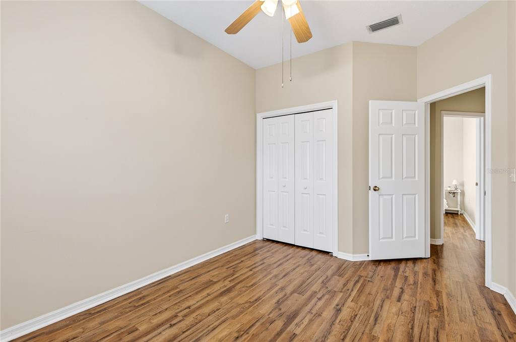 1737 Sassafras Drive Wesley Chapel, FL 33543 - Photo 26 of 58 wooden floor in an empty room
