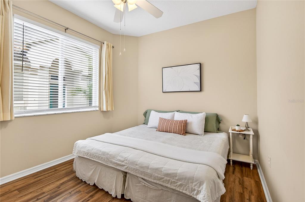 1737 Sassafras Drive Wesley Chapel, FL 33543 - Photo 27 of 58 a bedroom with a bed and a window