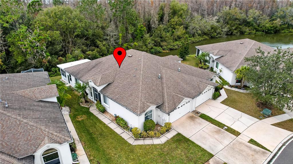 1737 Sassafras Drive Wesley Chapel, FL 33543 - Photo 41 of 58 an aerial view of a house with porch
