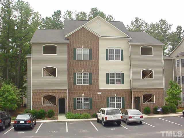 7024 Sandy Forks Road, Unit 101 Raleigh, NC 27615 - Photo 1 of 4 a car parked in front of a house