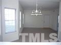 7024 Sandy Forks Road, Unit 101 Raleigh, NC 27615 - Photo 3 of 4 a view of a glass door