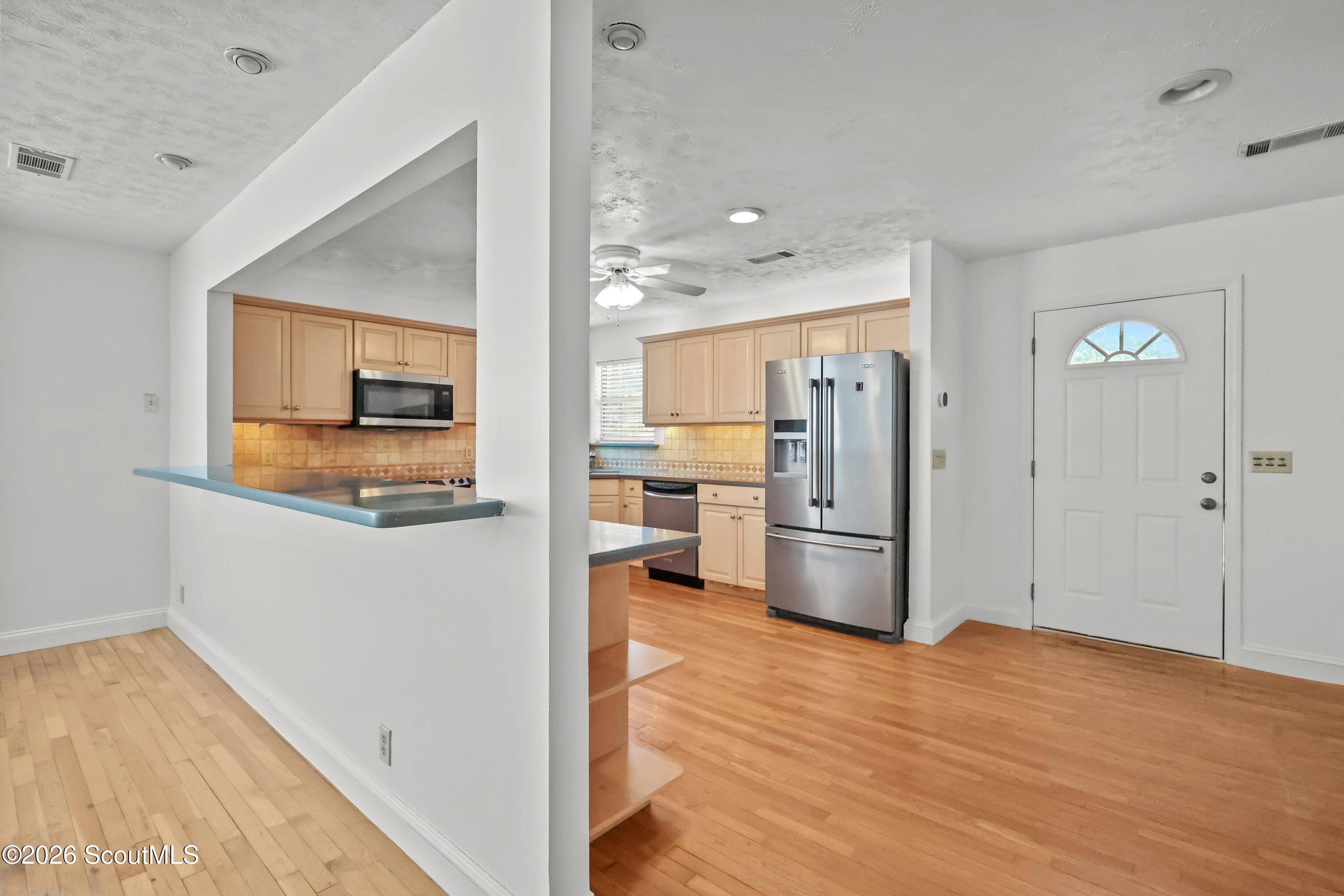 104 Sapelo Street St. Simons Island, GA 31522 - Photo 15 of 45 Pass through to kitchen