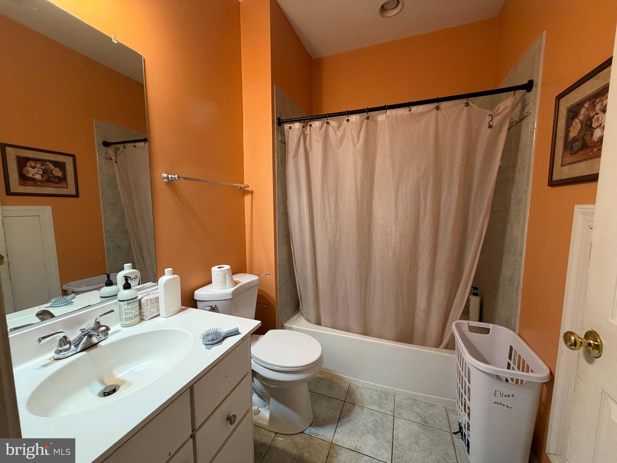 18724 Brooke Road Brinklow, MD 20862 - Photo 37 of 52 Vibrant bathroom with warm tones.