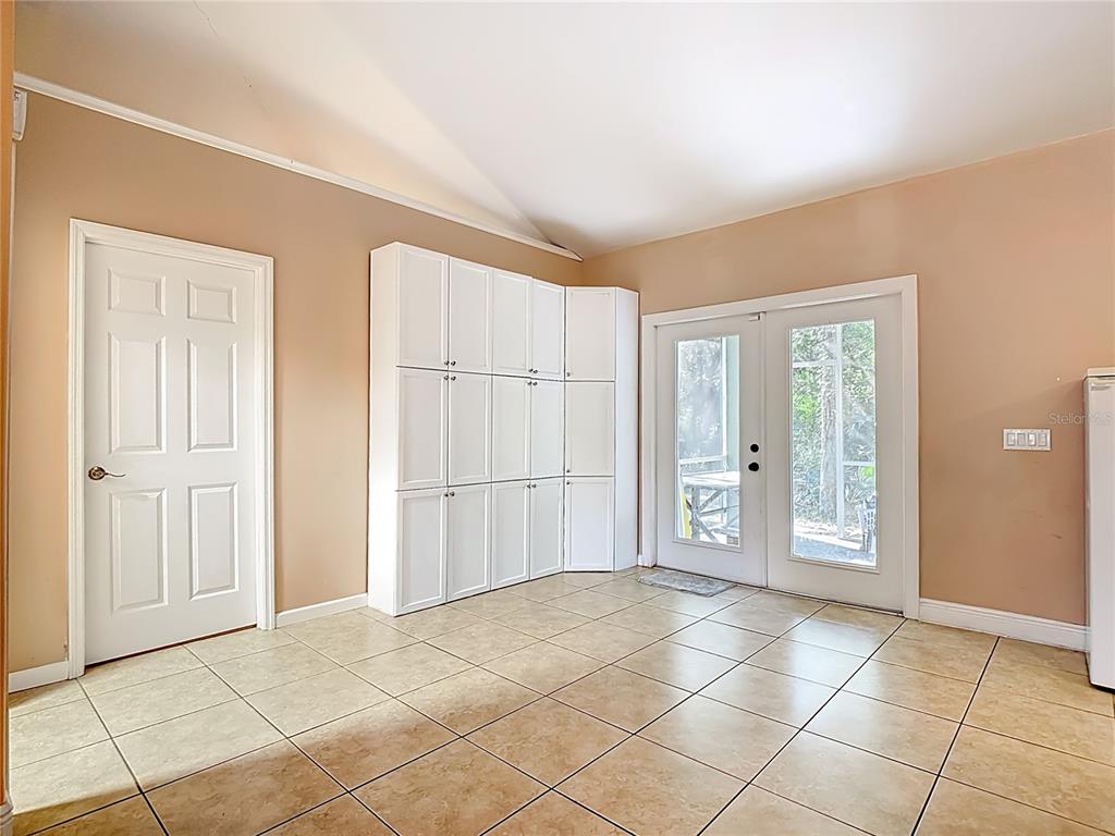 2730 68th Avenue Northeast Naples, FL 34120 - Photo 13 of 86 a view of a livingroom with an empty space and a windows