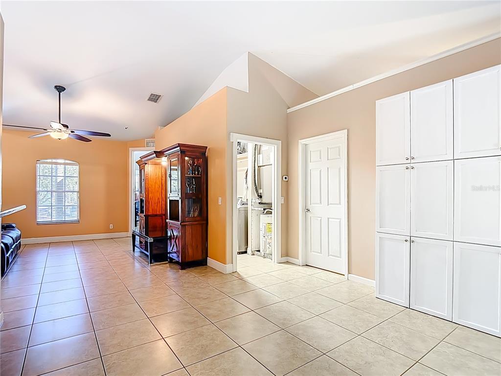 2730 68th Avenue Northeast Naples, FL 34120 - Photo 16 of 86 a view of a livingroom with a furniture and natural light