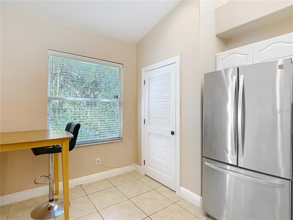 2730 68th Avenue Northeast Naples, FL 34120 - Photo 20 of 86 a view of a refrigerator in front of a window