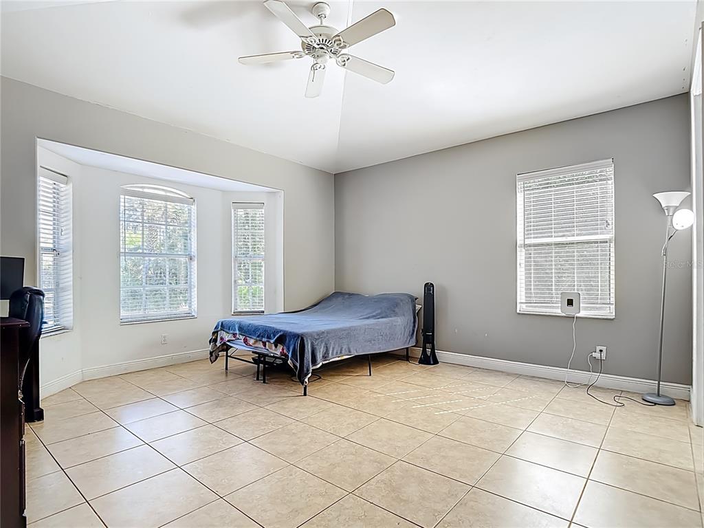 2730 68th Avenue Northeast Naples, FL 34120 - Photo 25 of 86 a living room with a window