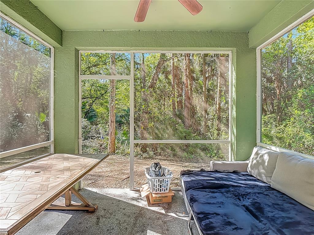 2730 68th Avenue Northeast Naples, FL 34120 - Photo 50 of 86 a living room with a large window