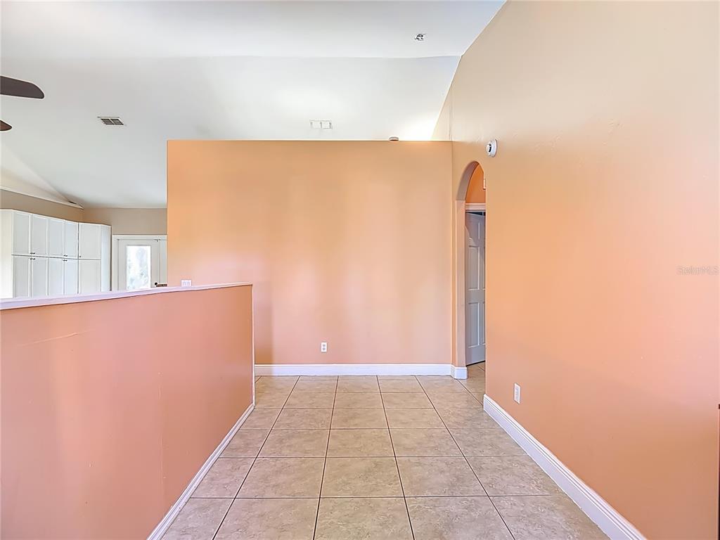 2730 68th Avenue Northeast Naples, FL 34120 - Photo 5 of 86 a view of an empty room
