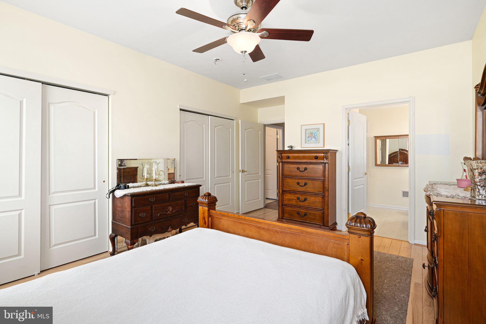3 Fairfield Drive Westampton, NJ 08060 - Photo 18 of 36 a bedroom with a bed and wooden floor
