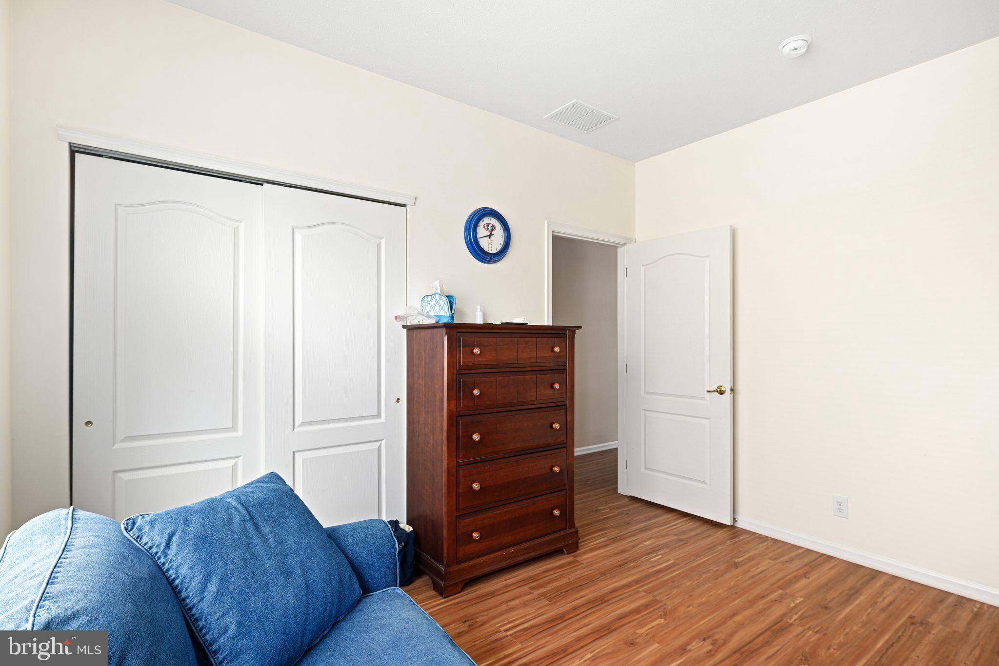 3 Fairfield Drive Westampton, NJ 08060 - Photo 22 of 36 a living room with a dresser and a window