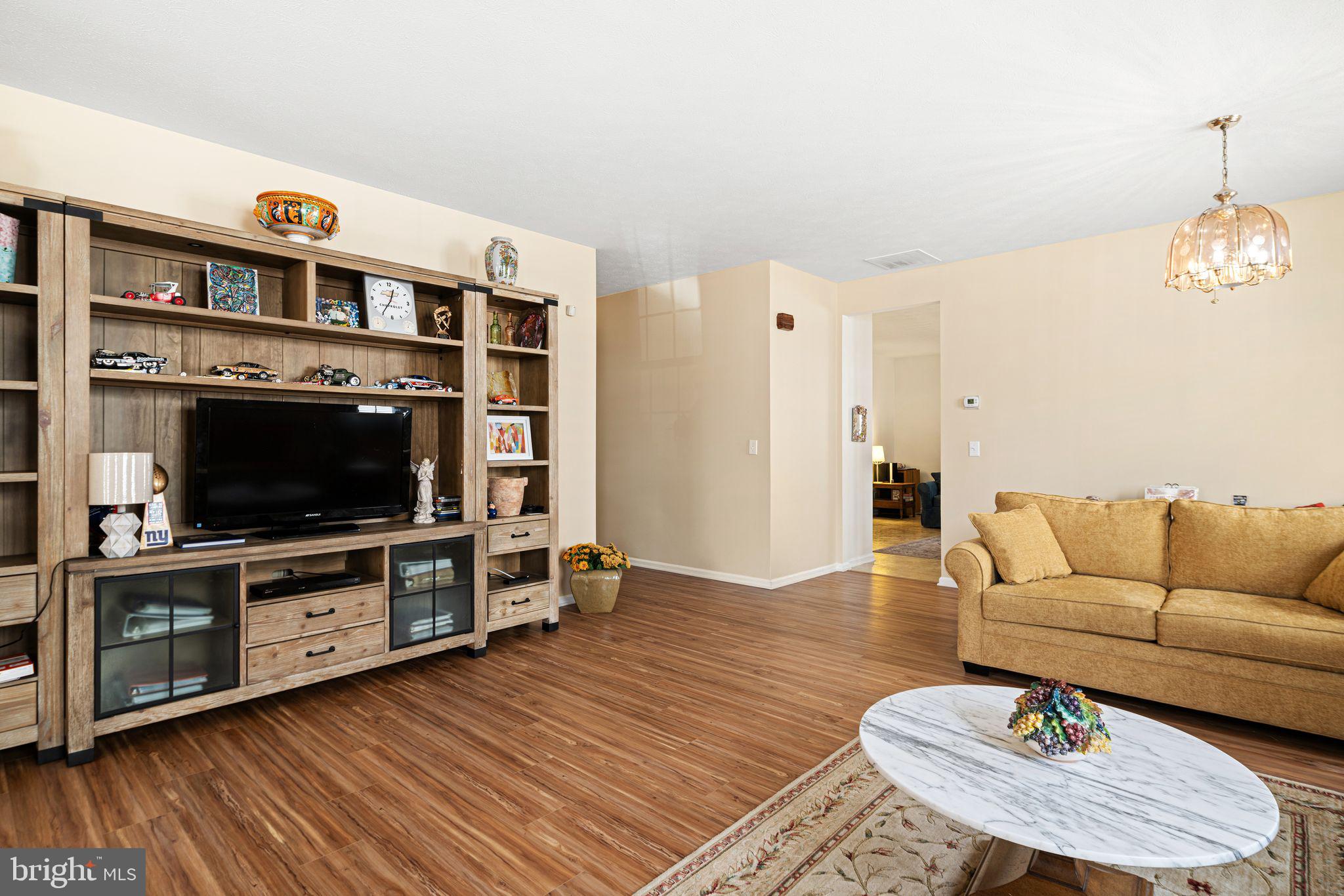 3 Fairfield Drive Westampton, NJ 08060 - Photo 9 of 36 a living room with furniture and a flat screen tv