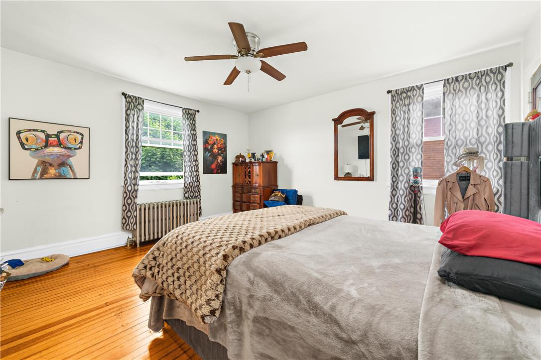 2055 Ferry Street Wilson, PA 18042 - Photo 11 of 21 This restful bedroom features warm hardwood floors and abundant natural light.