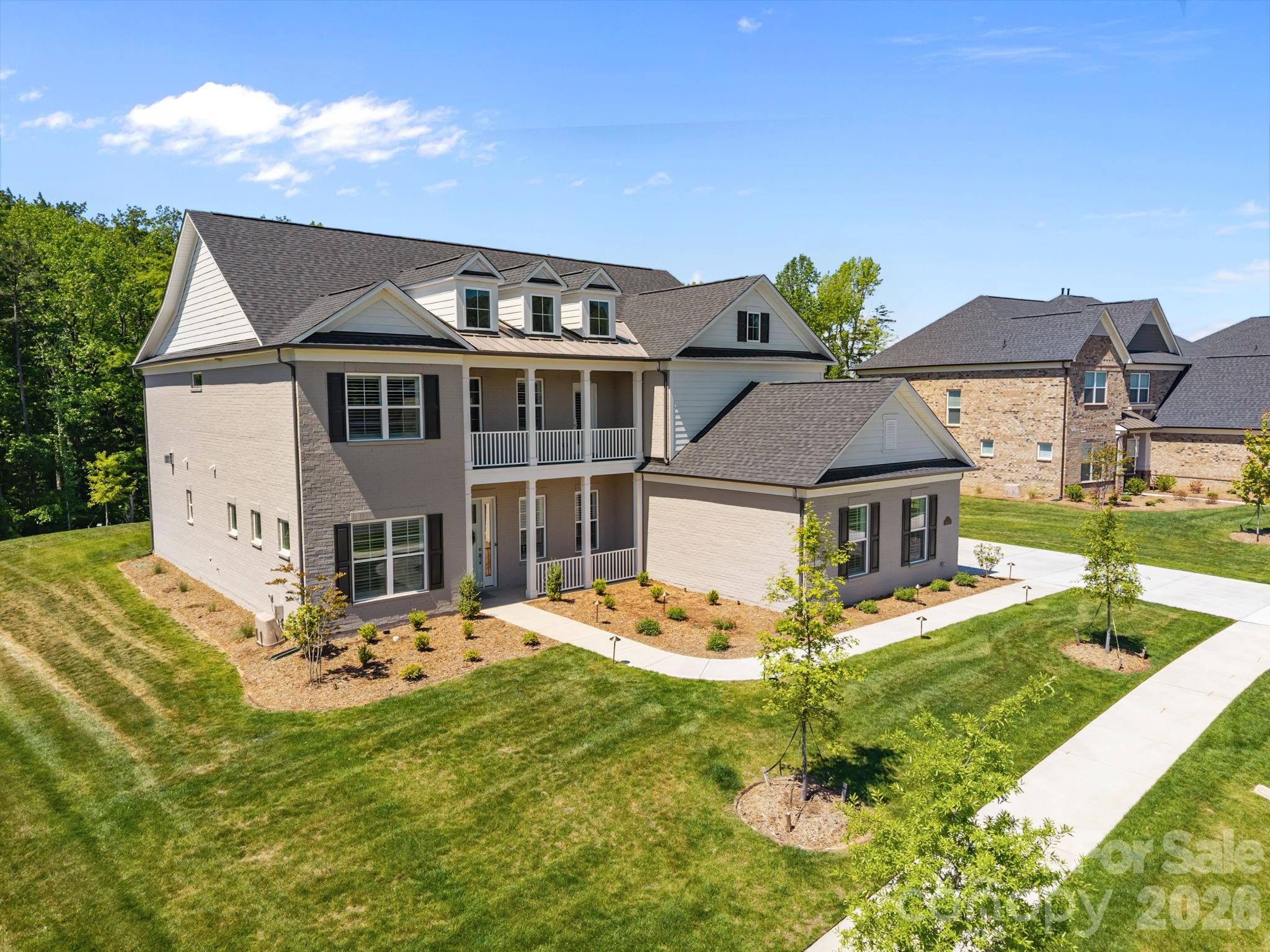 8620 Balcony Bridge Road Huntersville, NC 28078 - Photo 2 of 48 a front view of a house with garden