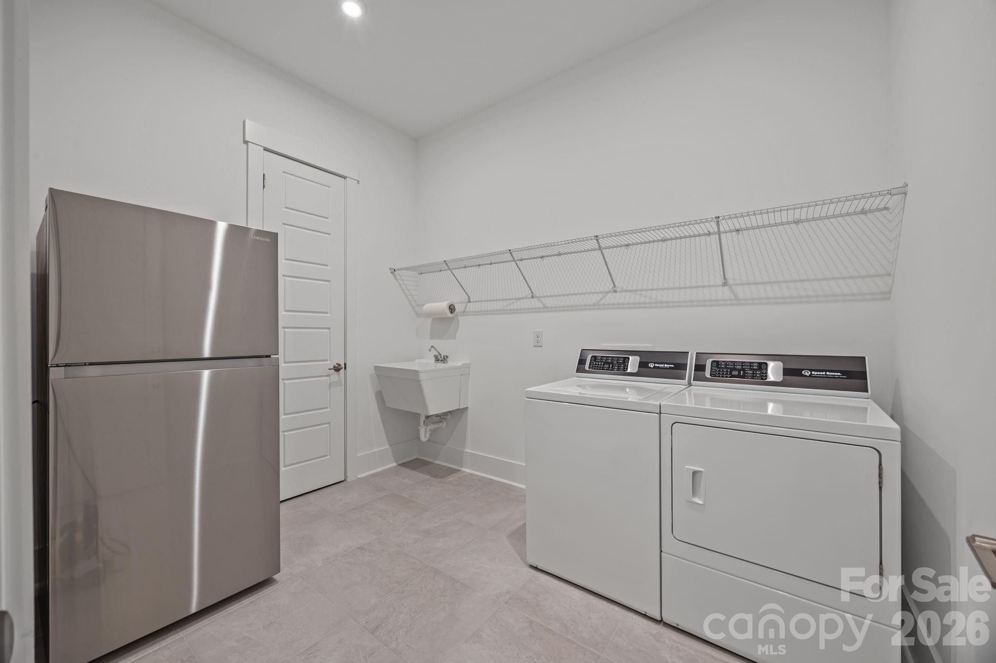 8620 Balcony Bridge Road Huntersville, NC 28078 - Photo 24 of 48 a utility room with dryer and washer