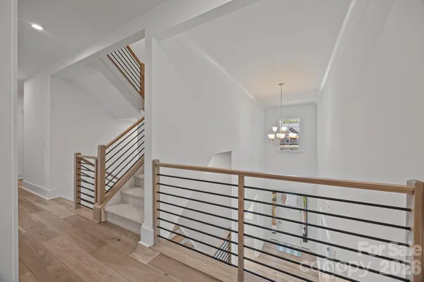 wooden floor in a hall with a window