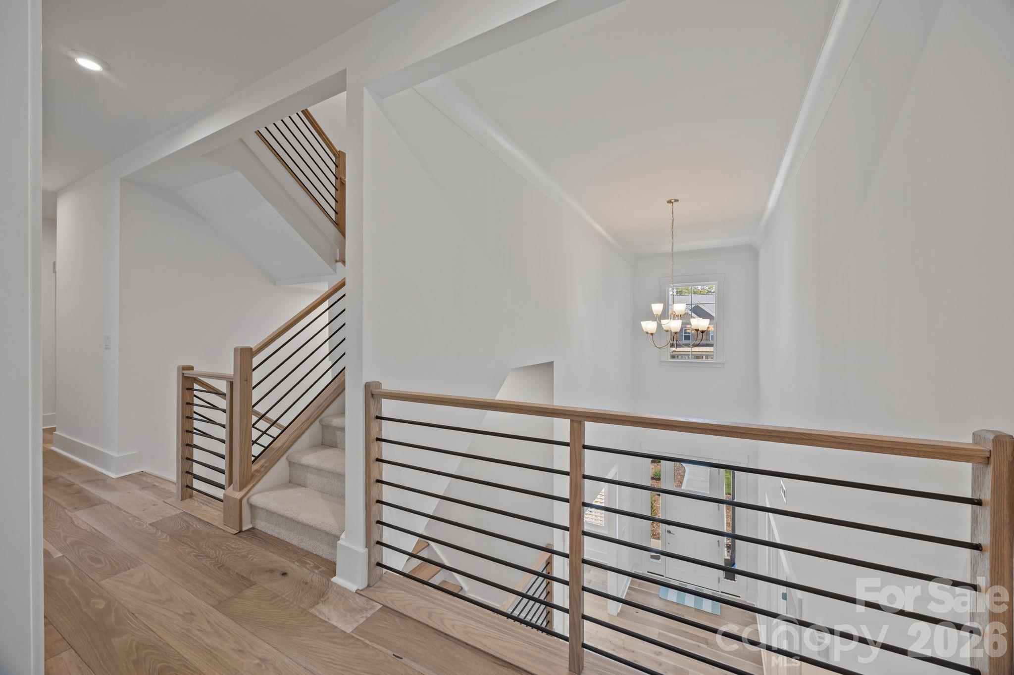 8620 Balcony Bridge Road Huntersville, NC 28078 - Photo 25 of 48 wooden floor in a hall with a window