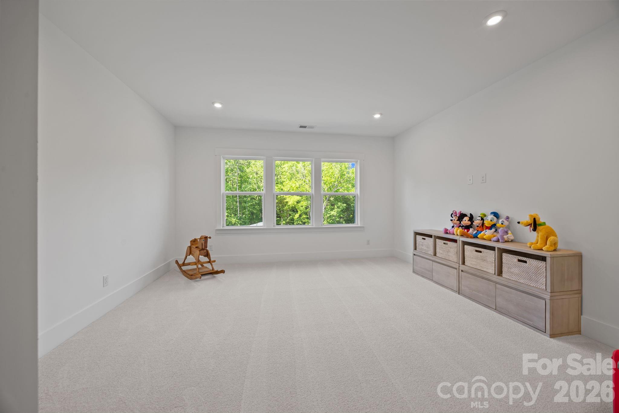 8620 Balcony Bridge Road Huntersville, NC 28078 - Photo 33 of 48 an empty room with windows and table