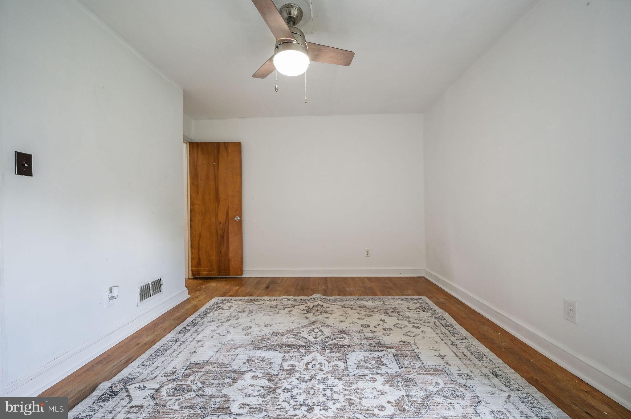 10 North Main Street Magnolia, DE 19962 - Photo 22 of 26 an empty room with a empty space and a window