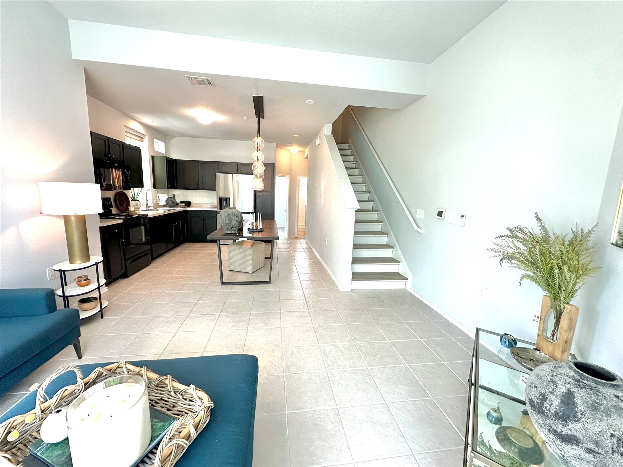 4323 Nitschke Street Austin, TX 78723 - Photo 5 of 11 Living room featuring light tile patterned floors