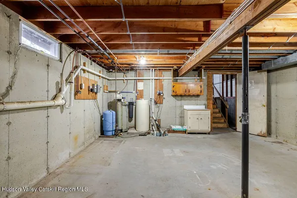 a view of a garage with stairs