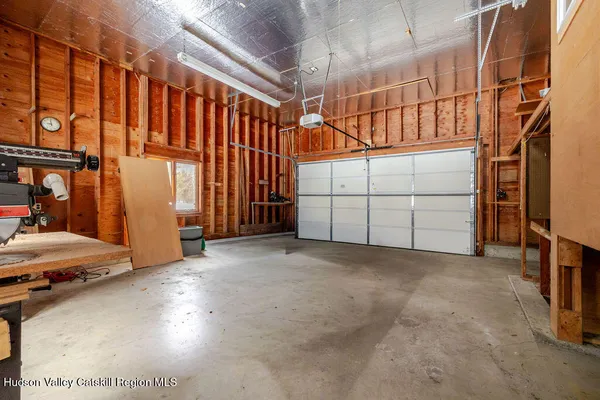 a view of a room with wooden walls