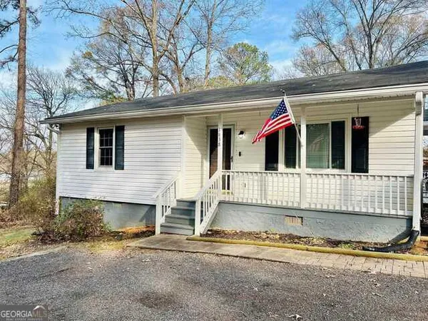 a front view of a house with a garage