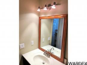 737 Heber Road Golden Valley, AZ 86413 - Photo 15 of 26 a bathroom with a sink and a mirror
