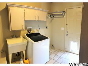 737 Heber Road Golden Valley, AZ 86413 - Photo 18 of 26 a utility room with washer and dryer