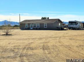 737 Heber Road Golden Valley, AZ 86413 - Photo 25 of 26 a front view of a house with a yard