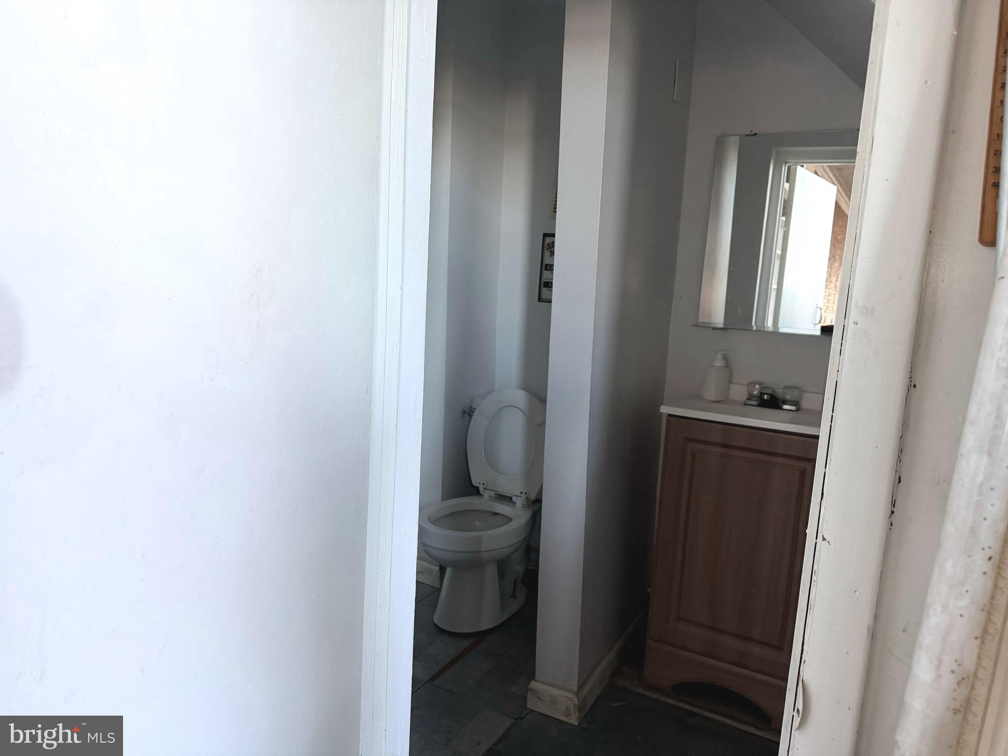3252 Keswick Road Baltimore, MD 21211 - Photo 16 of 39 half bath on main level