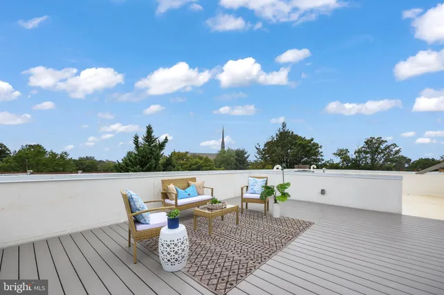 a view of an outdoor space with lounge chair