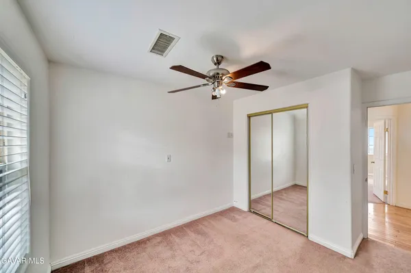 a bathroom with a toilet and a bathtub
